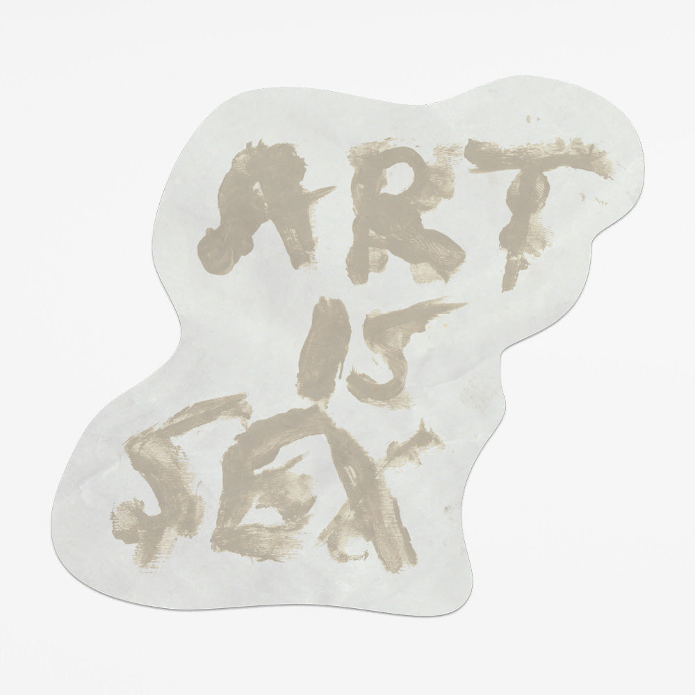 The phrase, "Art Is Sex" smeared on a light fabric with an indistinct liquid.
