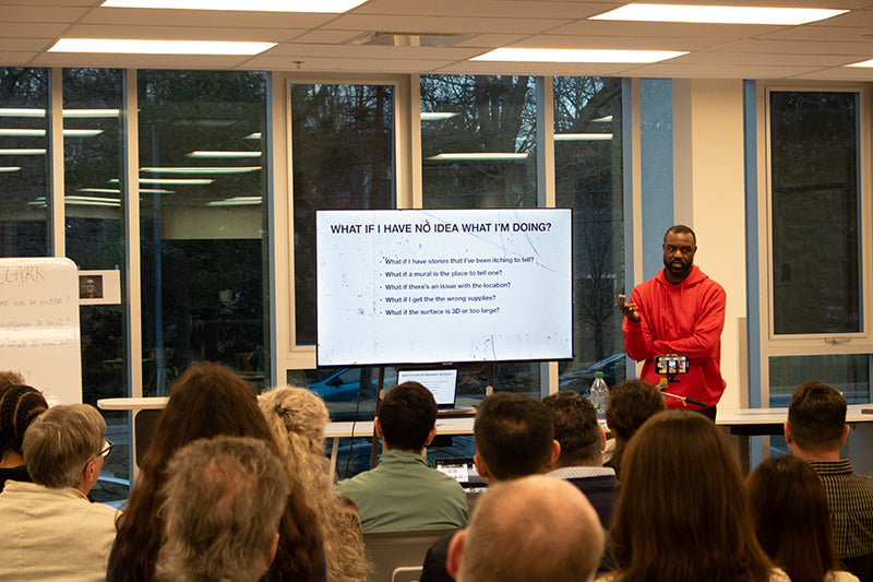 Duane Jones presenting in front of a small audience at St. Mary's University