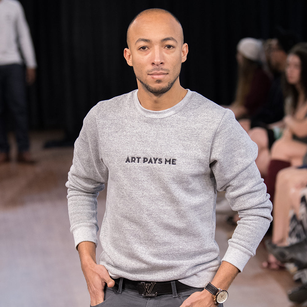 Red logo sweater on the runway