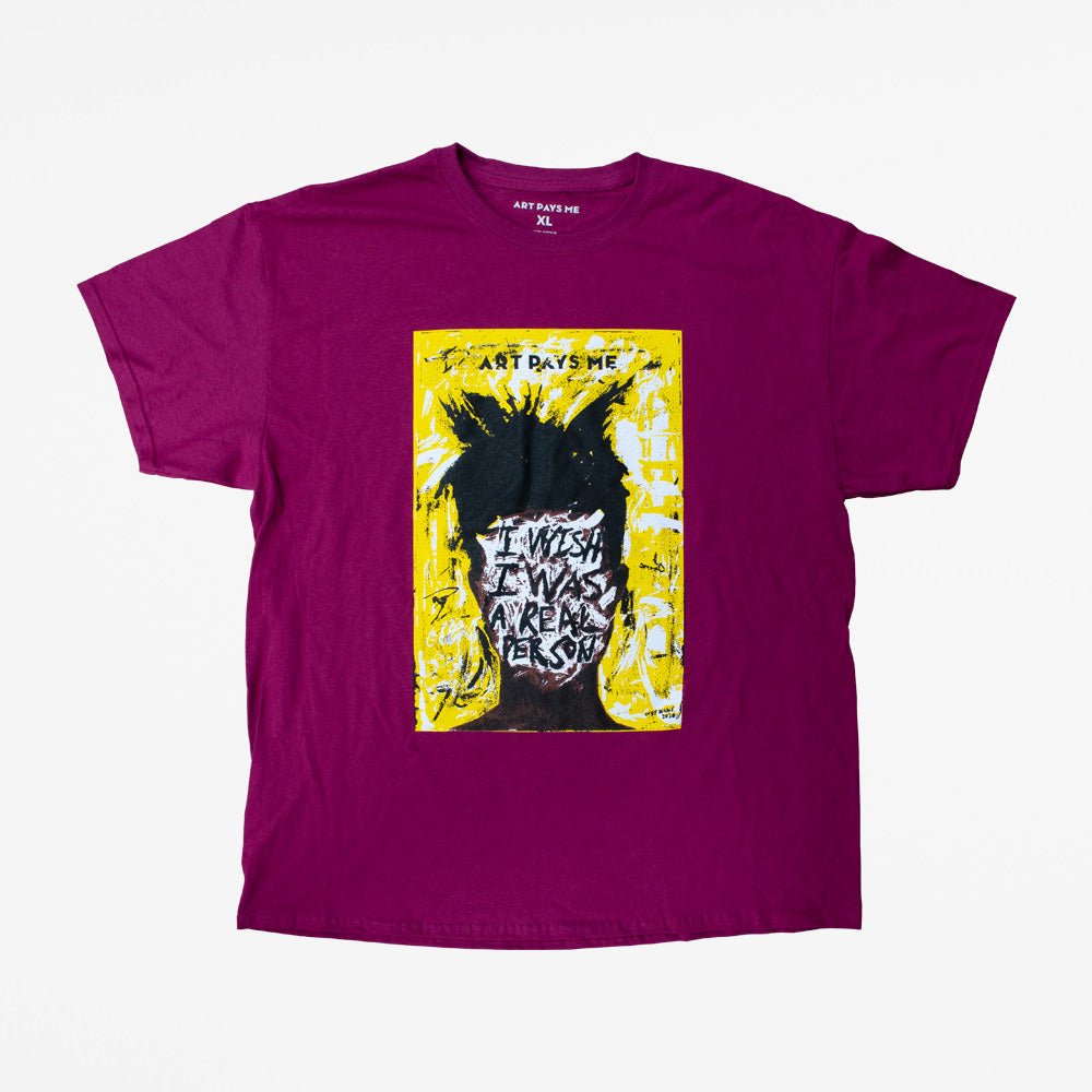 Berry coloured t-shirt with a portrait of Jean-Michel Basquiat screen printed on the front.