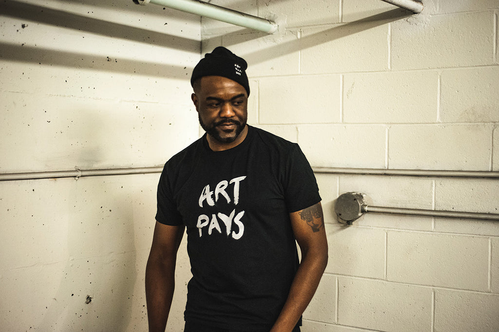 Art Pays Tee worn by Duane Jones. Photo by Alex Pearson