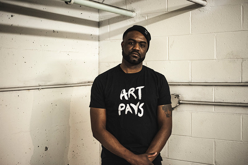 Art Pays Tee worn by Duane Jones. Photo by Alex Pearson